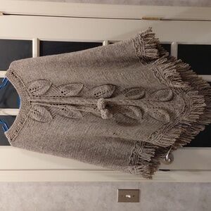 Elegant Light Brown, Sweater-Type Knit, 40in long ,36in wide Poncho.Has a small